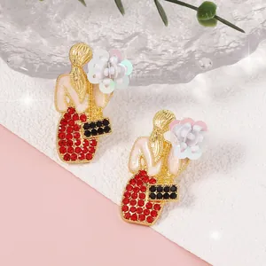 Orecchini a cartone animato alla moda con strass colorati e design floreale per donne