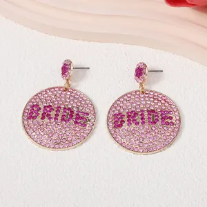 Rosafarbene Strass-Brautohrringe mit Gold-Finish und BRIDE-Schriftzug in rundem Design
