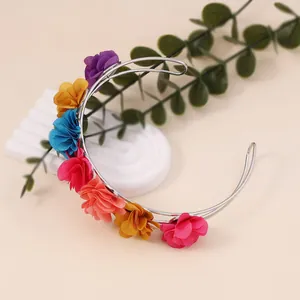 Floral U-shaped headband featuring colorful simulation flowers on a silver metal frame