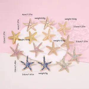 Detail of starfish stud earrings with pearls and colorful crystals on display board