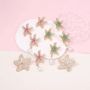 Fashionable gold starfish earrings with colorful zircons and pearls for beach style