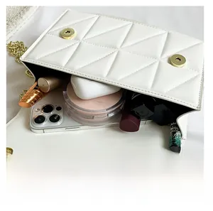 Detail showing the internal storage capacity for phone, lipstick and cosmetics