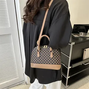 Classic patterned shell bag for women with contrast leather trim and crossbody strap