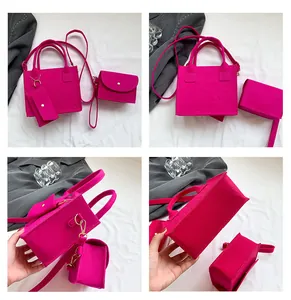 Détails d'un ensemble de sacs en feutre magenta avec relief floral et finitions dorées