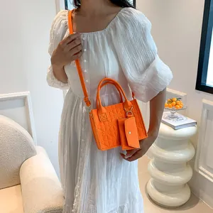 Sac fourre-tout en feutre orange avec gaufrage trèfle et bandoulière amovible