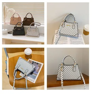 Detail view of retro geometric pattern tote bags in four colors with slim shoulder straps