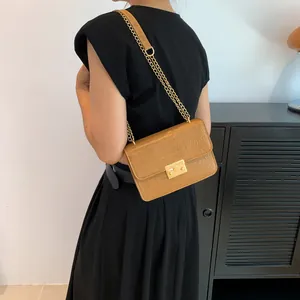Fashionable camel crocodile pattern chain crossbody bag with golden metal buckle for women