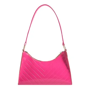 Glossy rose red patent leather underarm bag with V-quilted texture and gold hardware