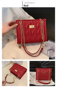 Three-way view of red quilted leather shoulder bag with gold chain and metal twist lock