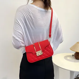 Red quilted crossbody bag with gold metal lock for women stylish shoulder bag