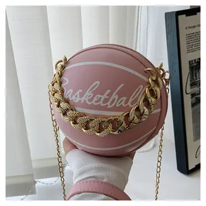 Detailed view of pink basketball round bag with golden chain and litchi texture