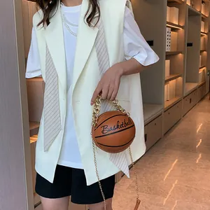 Fashionable basketball shaped crossbody bag with gold chain handle and shoulder strap