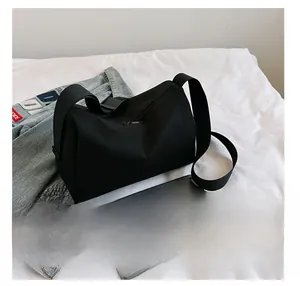 Detail view showing large capacity oxford tote bag holding a tablet for daily commuting