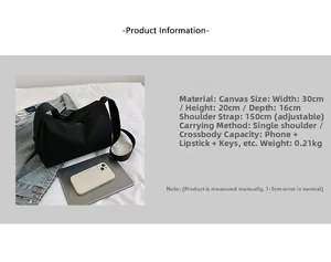 Detail view of black oxford tote showing 30x20x16cm dimensions and adjustable strap