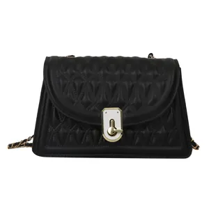 Chic black quilted chain crossbody bag with unique gold twist lock closure and shoulder strap