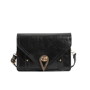 Classic black PU leather crossbody bag with gold triangle lock and V-flap design