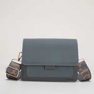 Minimalist blue patchwork small square shoulder bag with wide woven jacquard strap