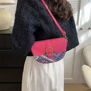 Ethnic style crossbody saddle bag with rose red leather and geometric woven pattern for women