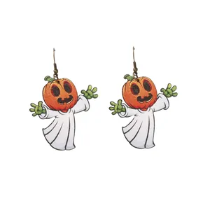 Detail of Halloween ghost pumpkin earrings with wooden print and bronze ear hooks