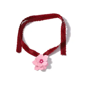 Romantic red ribbon choker necklace featuring a 3D pink enamel flower pendant detail