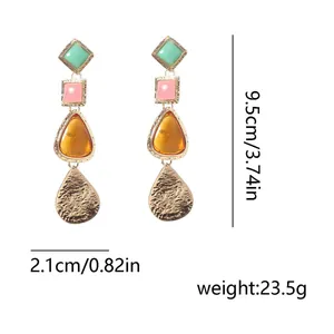 Detail view of colorful resin geometric drop earrings showing precise size measurements