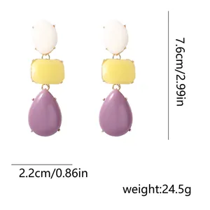Detail view of colorful resin teardrop earrings showing 7.6cm length and 2.2cm width