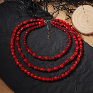 Collier multicouche gothique avec têtes de mort rouges et perles pour Halloween
