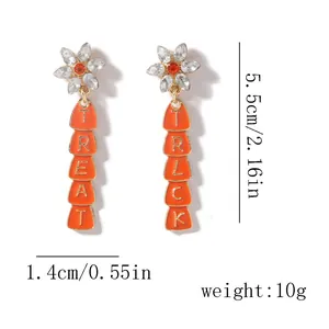 Detail view of Trick or Treat Halloween earrings with dimensions 5.5cm by 1.4cm