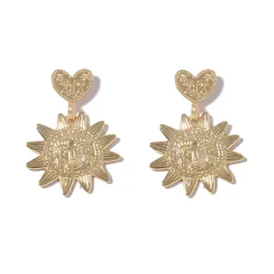 Fashionable gold alloy sun flower heart earrings with vintage embossed face design