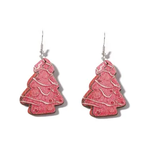 Boucles d'oreilles sapin de Noël en bois rose avec motifs de vagues et crochets argent