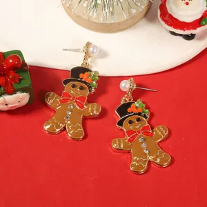 Χριστουγεννιάτικα σκουλαρίκια ανθρωπάκι gingerbread με καπέλο και πέρλα σε ντεκόρ