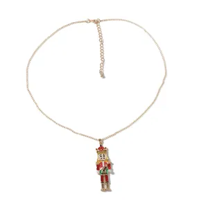 Golden necklace with a colorful nutcracker soldier pendant and adjustable chain link