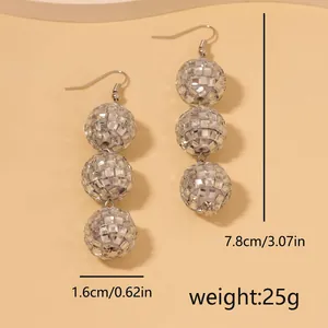 Sparkly silver three-tier disco ball drop earrings for women with mirror glass finish