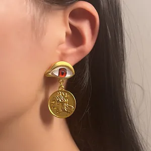Vintage gold asymmetric evil eye drop earrings with red iris and antique coin charms