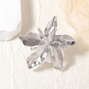 Minimalist silver flower open ring with brushed metal texture and pleated petals