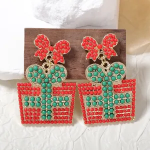 Pendientes de caja de regalo de Navidad con cuentas rojas, verdes y lazo dorado