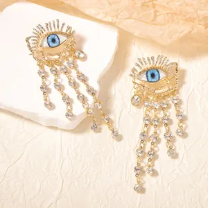 Εξαιρετικά χρυσά σκουλαρίκια Evil Eye με κρυστάλλινα φούντες και αστραφτερά στρας