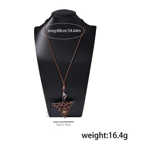 Detailed view of leopard print triangle pouch necklace with size and weight metrics