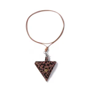 Close-up of leopard print triangle mini pouch with bronze button and lobster clasp lanyard