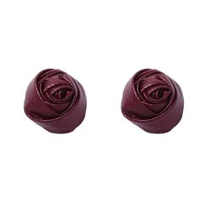 Handcrafted leather rose stud earrings in deep burgundy for a French romantic style