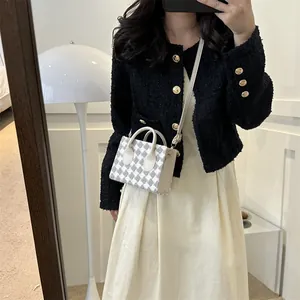 Elegant plaid mini handbag with white handles and crossbody strap for women