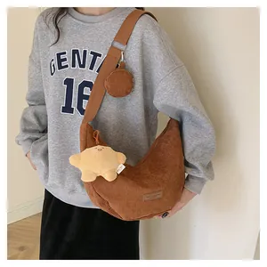 Brown corduroy dumpling bag set with small round pouch and yellow star plush charm