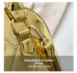 Detail showing the golden metallic finish on the quilted bag with removable shoulder strap