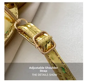 Macro detail of adjustable golden metallic shoulder strap with a square buckle