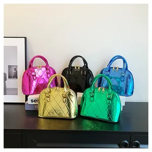 Close-up of glossy mini shell bags with diamond quilting in five vibrant metallic colors