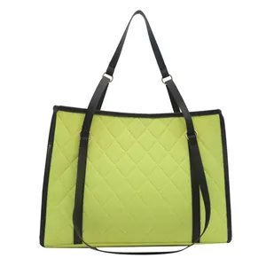 Fluorescent green quilted tote bag with black handles and large capacity design