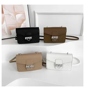 Detail showing quartet of textured crossbody square bags in black, coffee, beige, and white