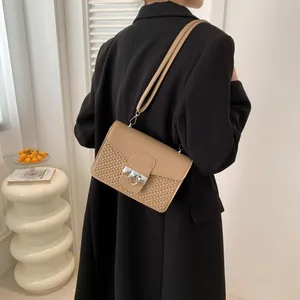Fashionable khaki crossbody bag for women with woven texture and silver ring clasp