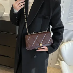 Quilted brown crossbody chain bag for women with gold hardware and minimalist design