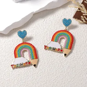 Handmade rainbow bead earrings with blue hearts, pencils and clouds for teachers